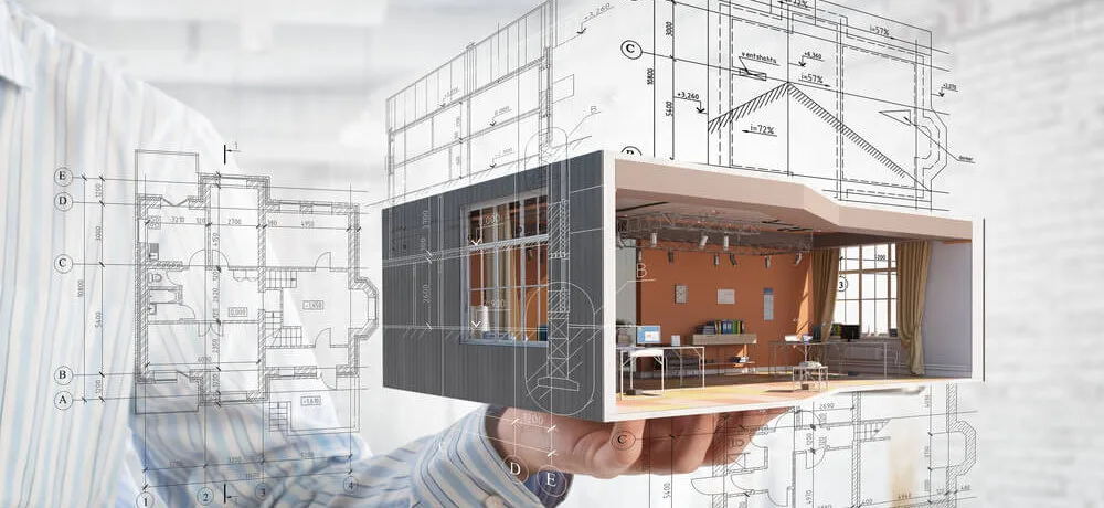 Homem segurando um projeto de casa, com um projeto semelhante na parede ao fundo.